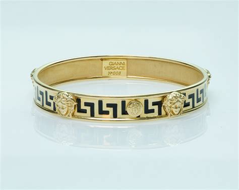 versace design gold bangles|versace g string.